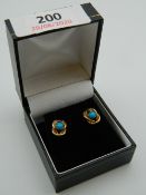 A pair of 9 ct gold and turquoise earrings. 1 cm high (2.