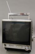 A boxed Sony First Portable Transistor TV. The box 32 cm high.