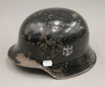 A WWII Nazi helmet. 28 cm long.