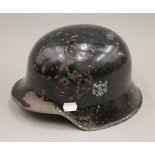 A WWII Nazi helmet. 28 cm long.