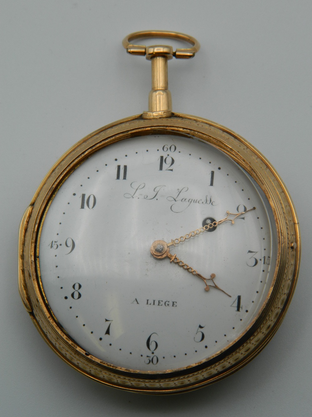 An 18 ct gold Verge repeating pocket watch. 6 cm diameter (147.