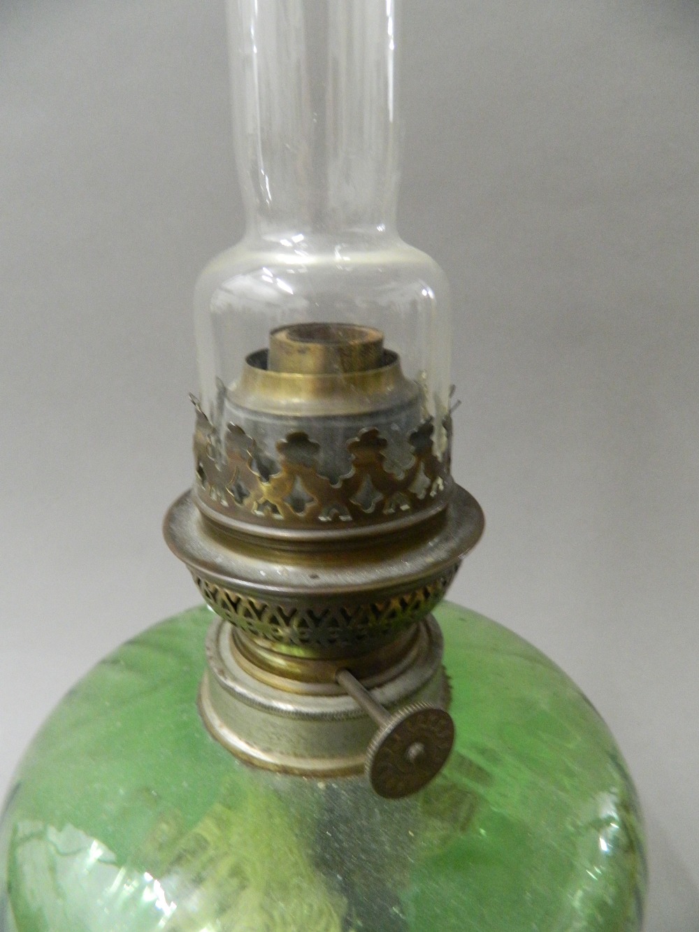 A Victorian oil lamp with green glass reservoir. 52 cm high. - Image 2 of 5