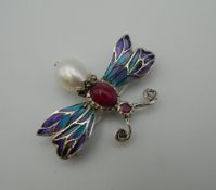 A silver plique a jour butterfly brooch. 4 cm wide.