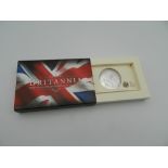 A boxed 2011 silver Britannia coin