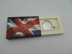 A boxed 2011 silver Britannia coin