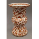 A 19th century Chinese Gu vase decorated with iron red and gilt flowers. 33.5 cm high.