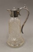 A silver plate mounted cut glass claret jug. 27.5 cm high.