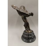 A large bronze model of The Spirit of Ecstasy, mounted on a stepped plinth base. 64.5 cm high.