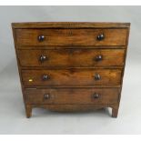 An early 19th century mahogany chest of drawers. 92.5 cm wide.