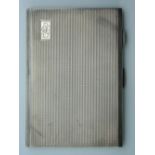 An engine turned hallmarked 1945 solid silver cigarette case. 12.5 cm wide. 6.7 troy ounces.
