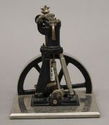 A German miniature model stationary engine. 15 cm high.