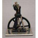 A German miniature model stationary engine. 15 cm high.