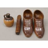 A pair of salt glaze shoes, a treen shoe and a miniature Doulton ewer. The former each 11.5 cm long.