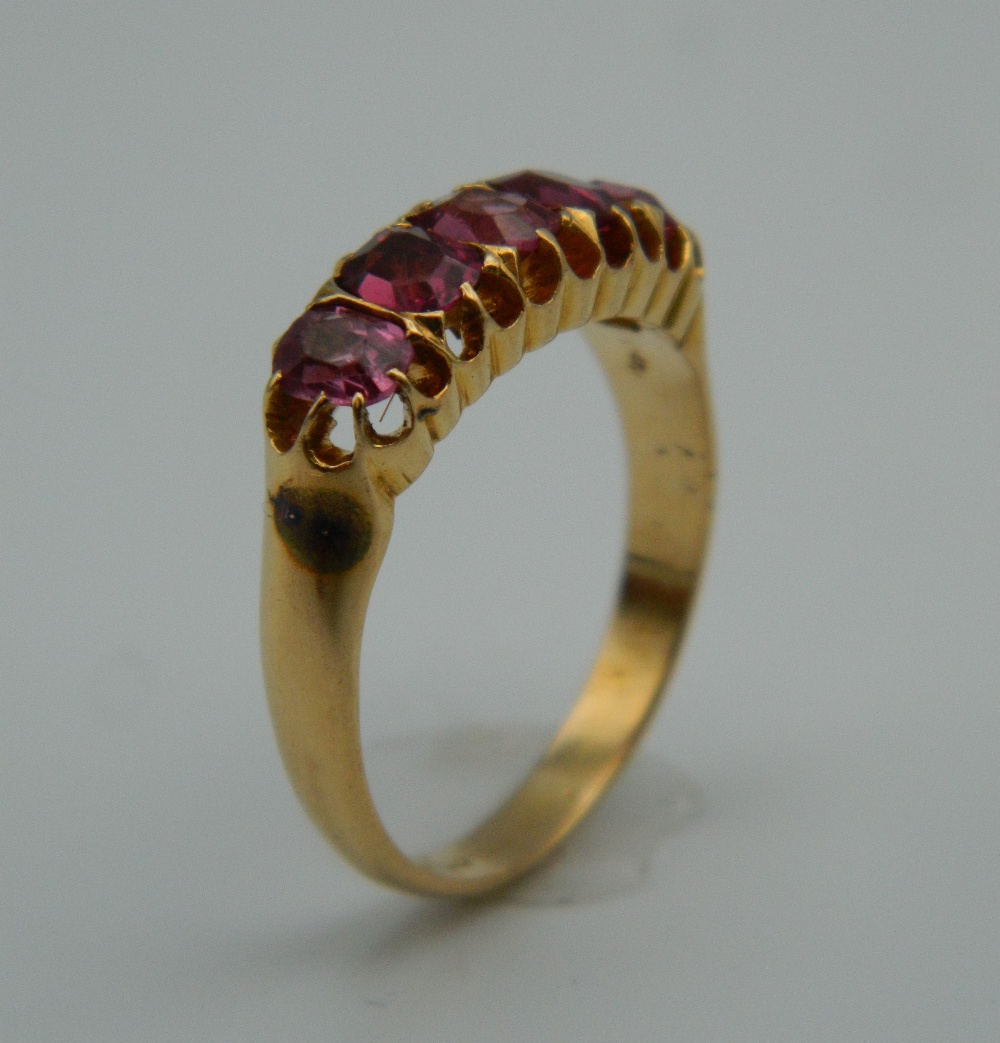 An 18 ct gold five stone pink topaz ring. Ring Size O. 4.2 grammes total weight. - Image 2 of 4