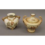 Two Royal Worcester blush ivory florally decorated vases. The largest 20 cm high.