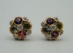 A pair of 9 ct gold, diamond and multi stone earrings. 1 cm diameter.