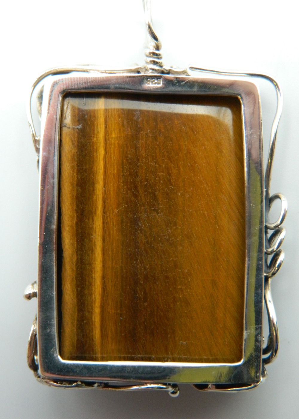 A silver and tigers eye pendant. 6 cm high. - Image 2 of 3