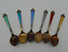 A boxed set of Norwegian enamel coffee spoons. The box 13 cm wide.