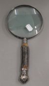 An antler handled magnifying glass. 27.5 cm long.