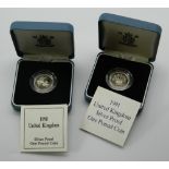Two solid silver £1 coins,
