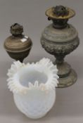 Two Victorian oil lamps and a vaseline glass shade. The latter 20.5 cm high.