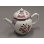 An 18th century Chinese lidded teapot. 19 cm wide.