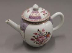 An 18th century Chinese lidded teapot. 19 cm wide.