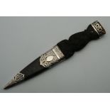 A Scottish silver mounted Skean Dhu, in a leather scabbard, hallmarked for Edinburgh 1910,