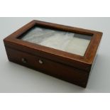 A small Victorian rosewood cased music box. 11.5 cm long.