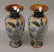 A pair of Doulton Lambeth blue flower vases. 28 cm high.
