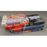 A quantity of various board games and jigsaws
