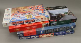 A quantity of various board games and jigsaws