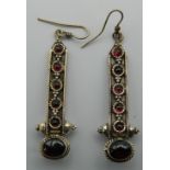 A pair of 925 silver and garnet earrings. 5.5 cm high.