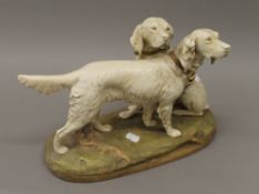 A Royal Dux porcelain model of two retrievers. 36 cm wide.