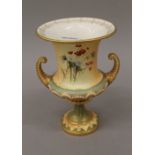 A Royal Worcester blush ivory Campana urn. 19 cm high.