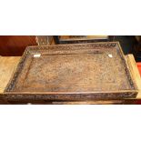 An Eastern carved wooden tray. 54.5 cm wide.
