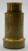 A small Jones of London three drawer brass telescope. 14.5 cm extended.