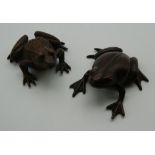 Two Japanese bronze frogs. The largest 4 cm long.