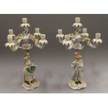 A pair of figural porcelain candelabra. 55 cm high.