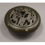 A gold splash bronze lidded censer. 9 cm diameter.