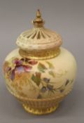 A Royal Worcester blush ivory pot pourri vase and cover. 19 cm high.