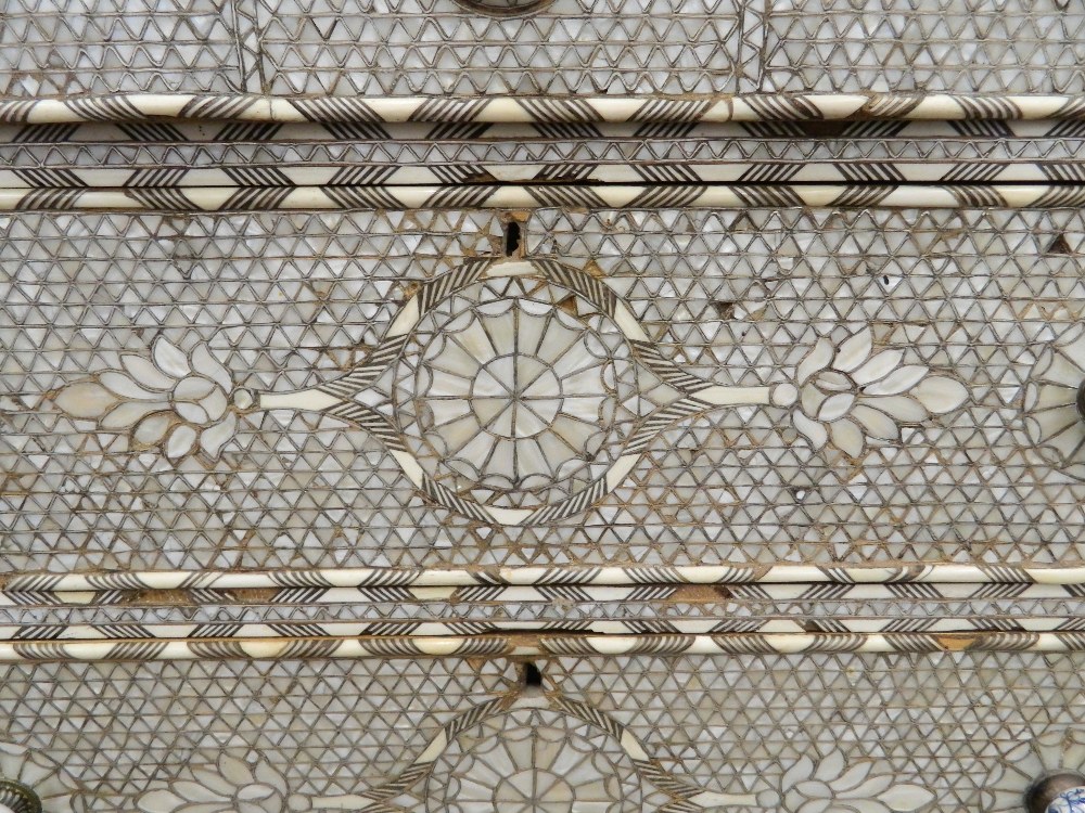 A Syrian mother-of-pearl inlaid chest of drawers with associated marble top. - Image 7 of 25