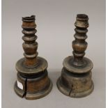 A pair of treen fruitwood candlesticks. 17 cm high.