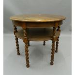 An inlaid oak barley twist coffee table