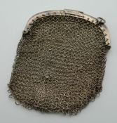 An unmarked silver mesh coin purse. 8.5 cm high.