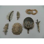 A collection of silver brooches, etc.