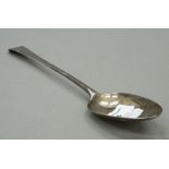 A Georgian silver basting spoon. 29.5 cm long. 3.3 troy ounces.