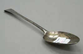 A Georgian silver basting spoon. 29.5 cm long. 3.3 troy ounces.