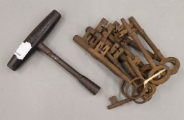 A bunch of eleven antique iron keys.