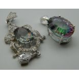 Two silver and cubic zirconia multi-coloured pendants. The largest 6 cm high.